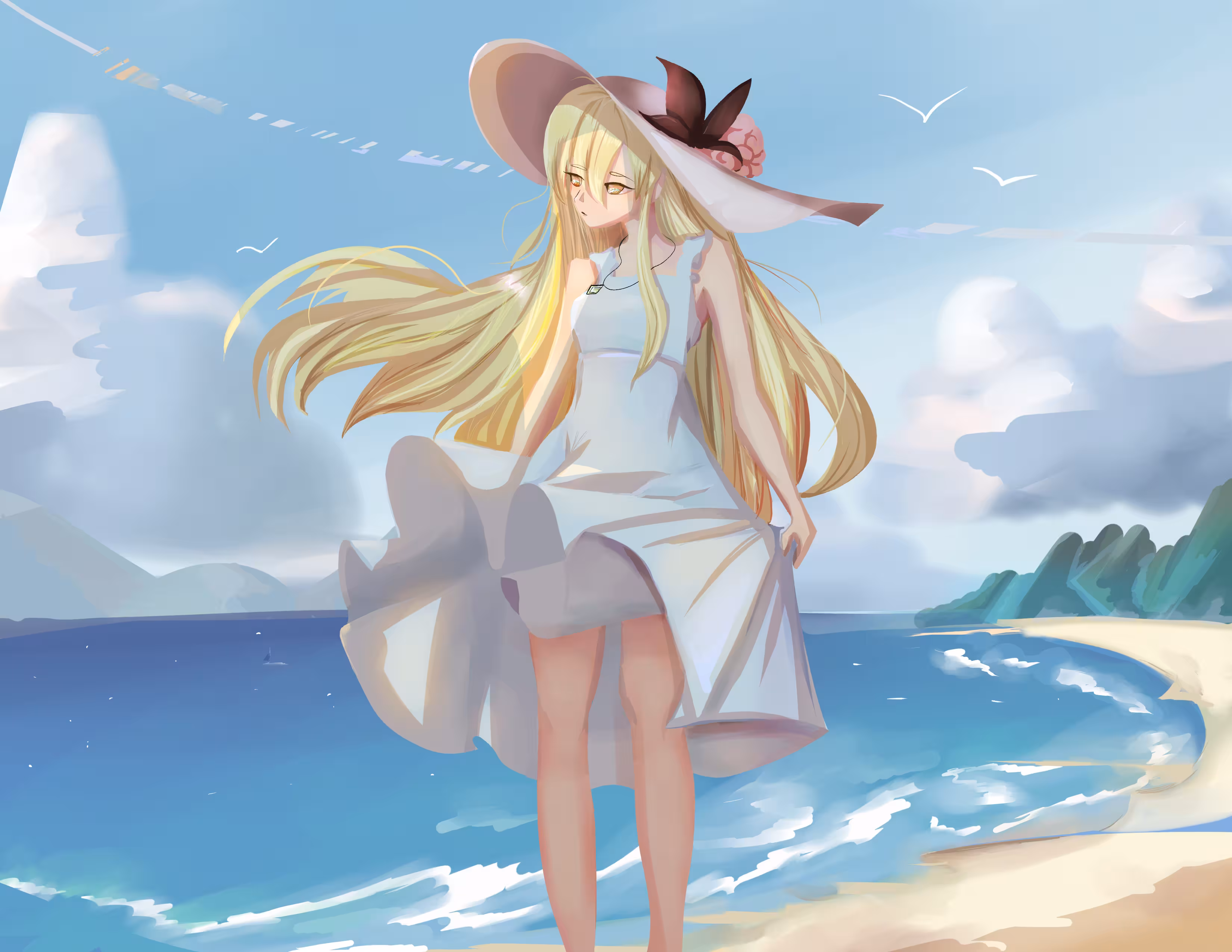 A blonde woman standing on a beach while the wind blows her dress.